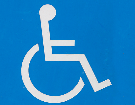 Sign for person in wheel chair