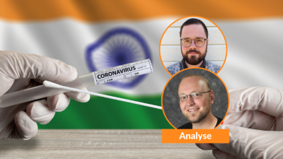 Indian flag, vaccine, two men 