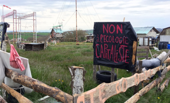 “No to Green Capitalism” L’Amassada Commune (ZAD), Southern France. Source: Alexander Dunlap