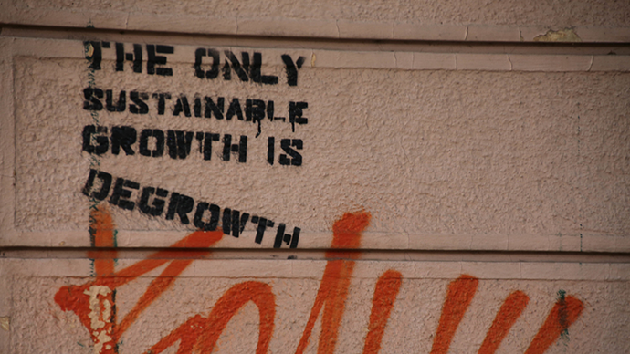 photo showing quote on wall the only sustainable growth is degrowth